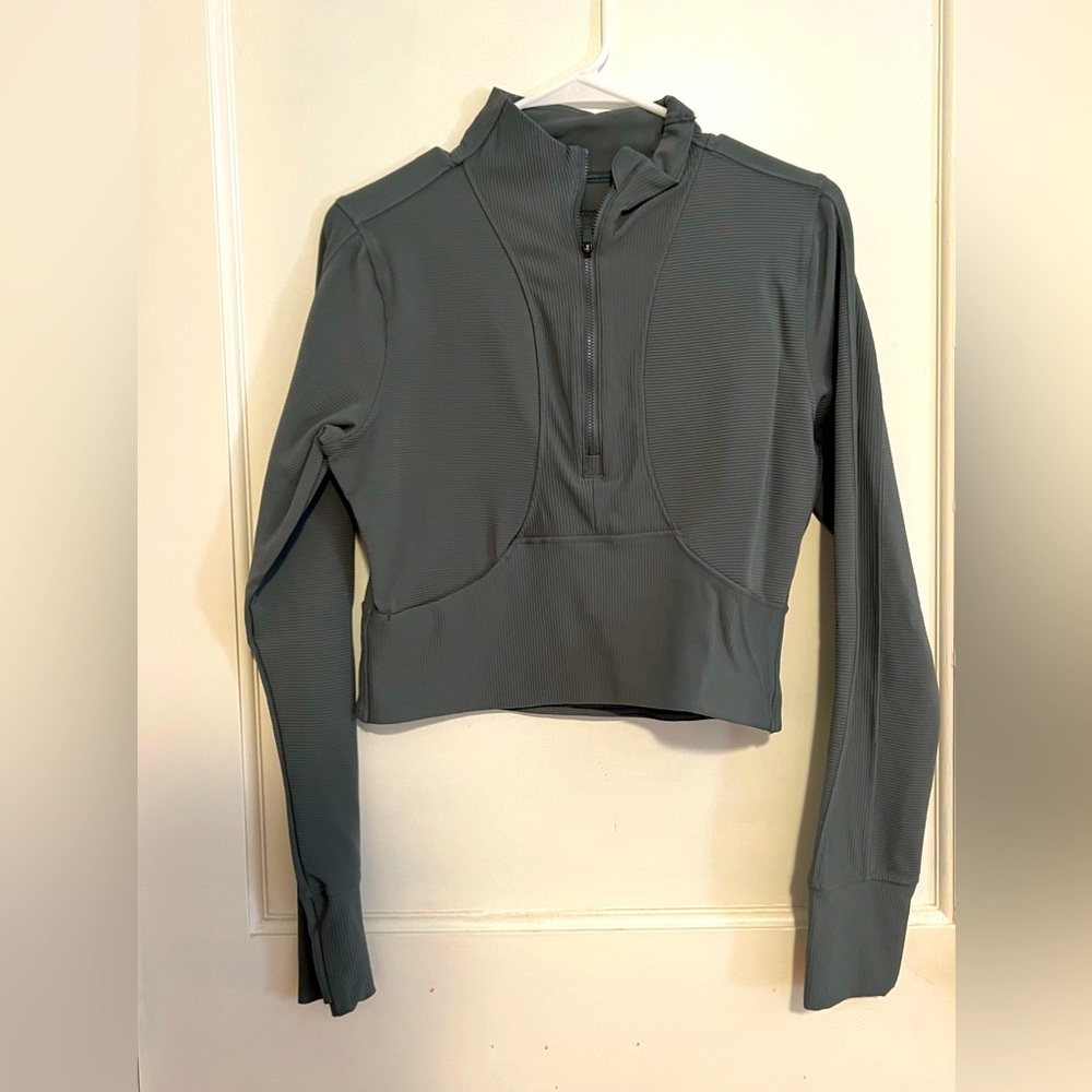 Off-green cropped jacket, half zip-up. Never worn.